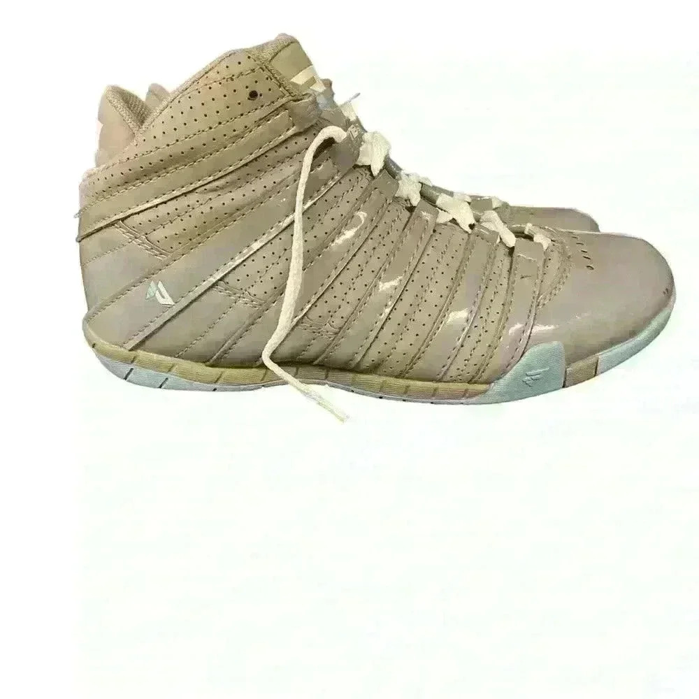 Protege youth size 5M/Y tennis shoes mid top.